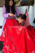 Laden Sie das Bild in den Galerie-Viewer, 240 youngboy by NancyS forced forwardwash and buzz too short in red vinyl cape and RSK apron